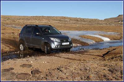 Terios Crossing A Stream